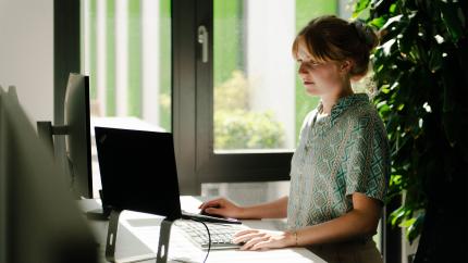 ClimatePartner employee working at the computer