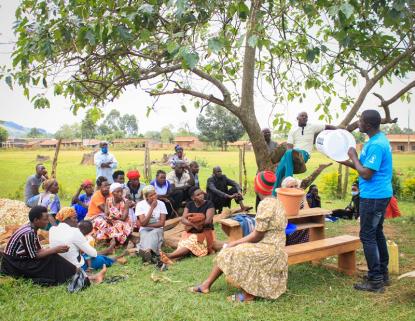 people in uganda sitting in group