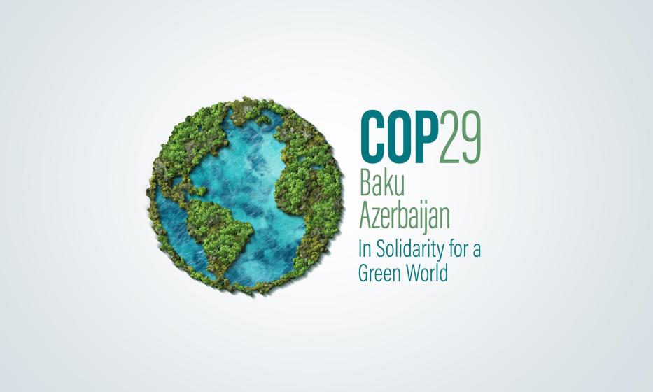 COP29 Schriftzug und eine stilisierte Weltkugel